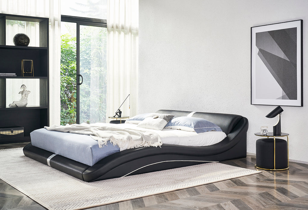 PAOLA – Cama estofada em pele sintética preta com cabeceira ondulada acolchoada