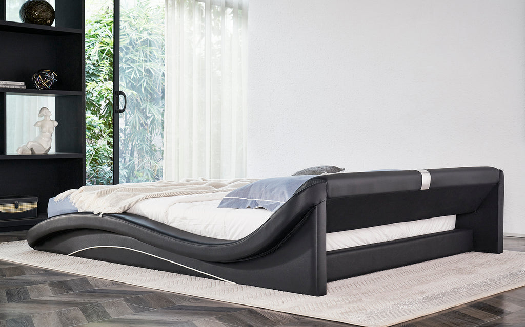 PAOLA – Cama estofada em pele sintética preta com cabeceira ondulada acolchoada